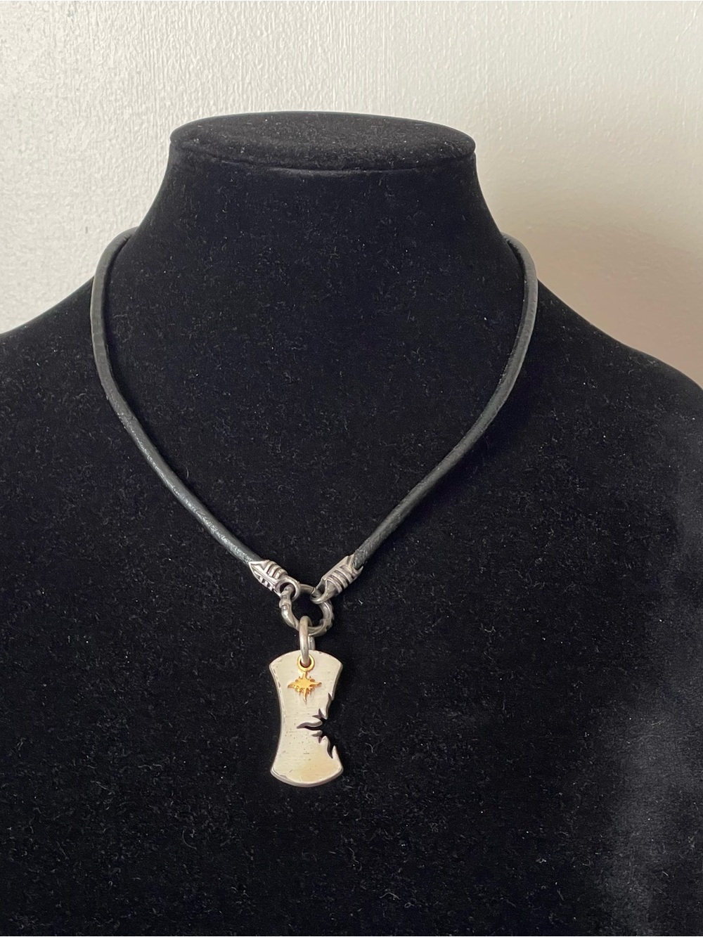 Black Leather Cord Necklace with Silver Pendant and Gold Accent